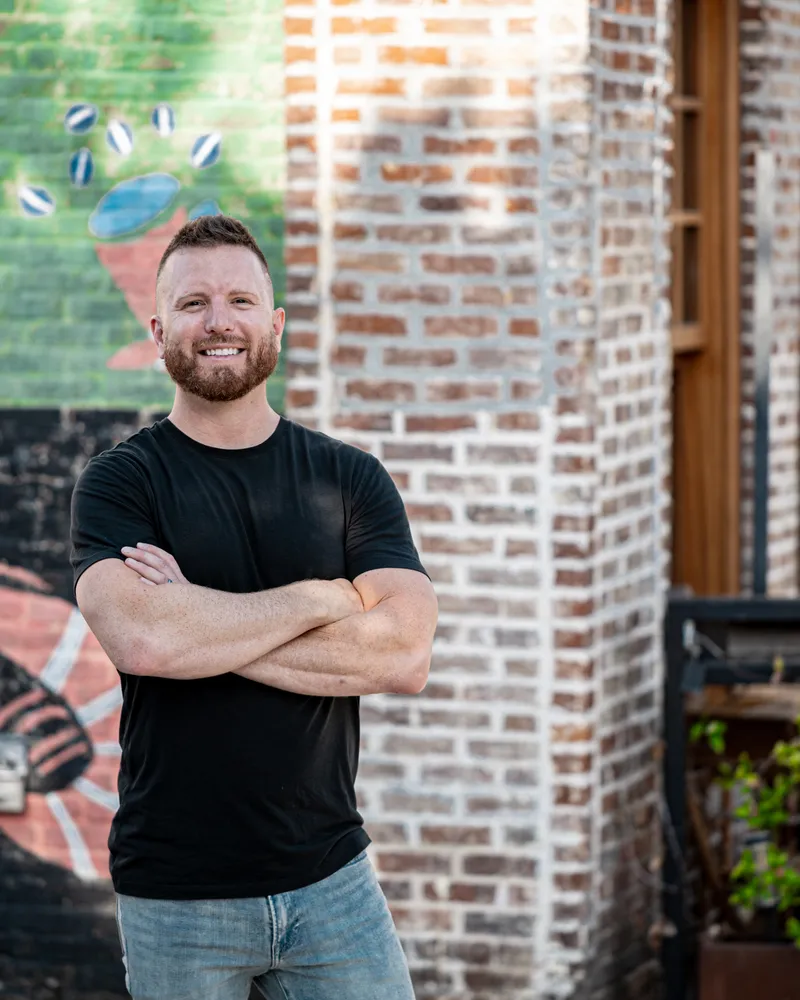 Austin Houser — Mural, arms crossed